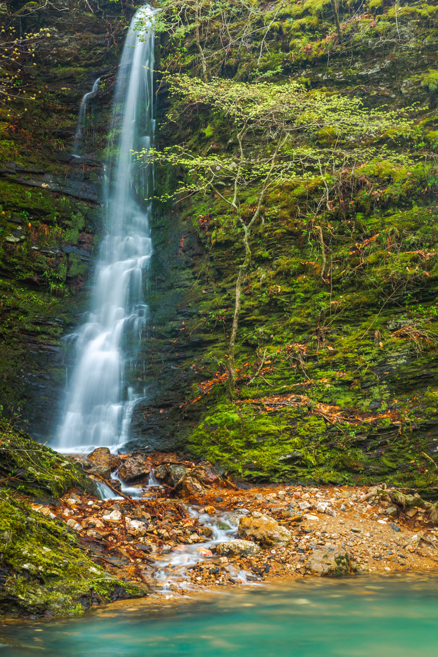 A waterfall pours off the the bluff into Blaylock Creek during April.