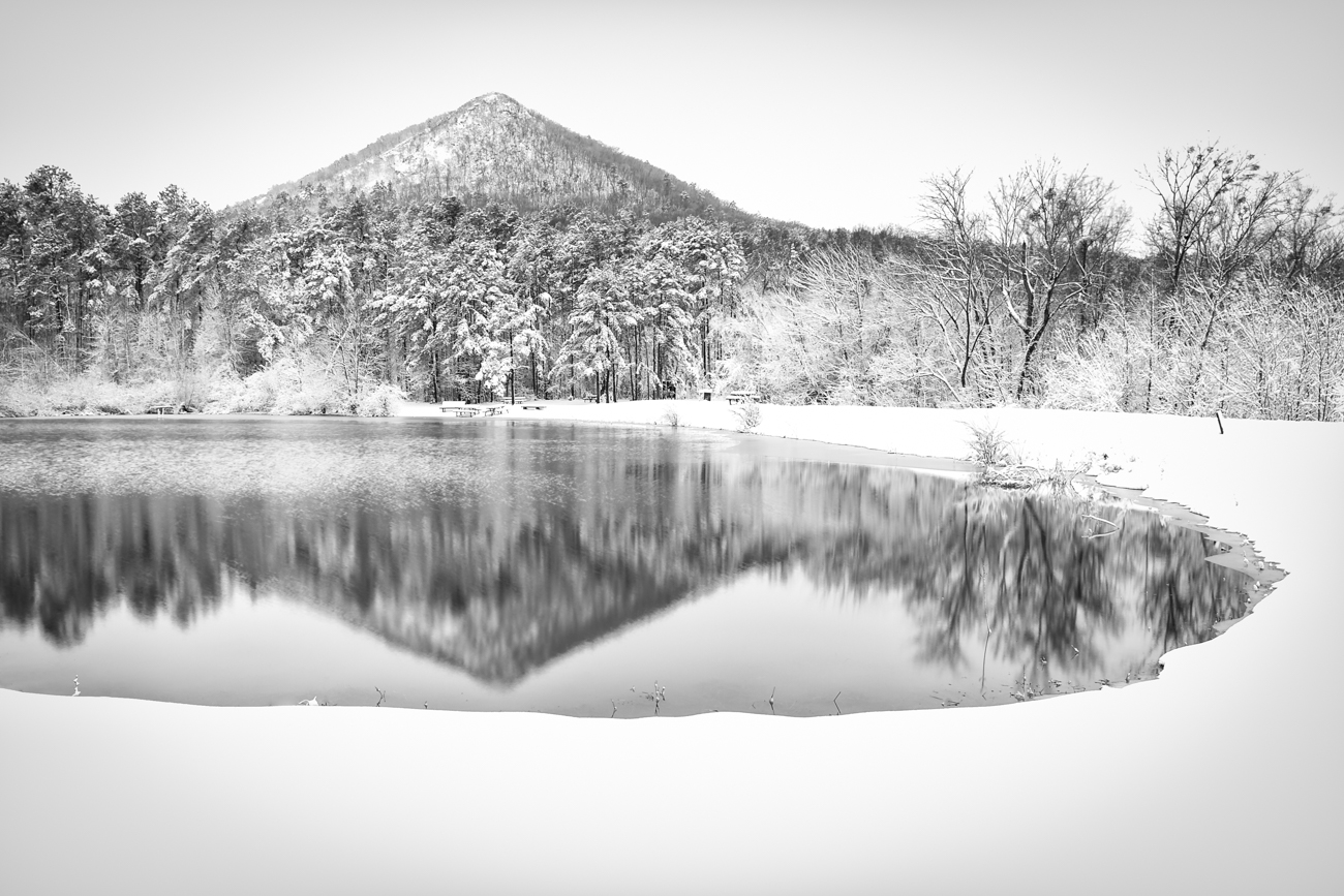 A heavy snow blankets the landscape of Pinnacle Mountain State Park west of Little Rock.